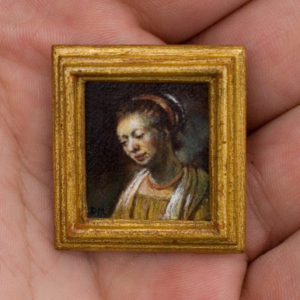 Detail van het miniatuurschilderij portret van een jonge vrouw. Origineel is van Rembrandt van Rijn. Met handgemaakte 24 karaat bladgoud lijst